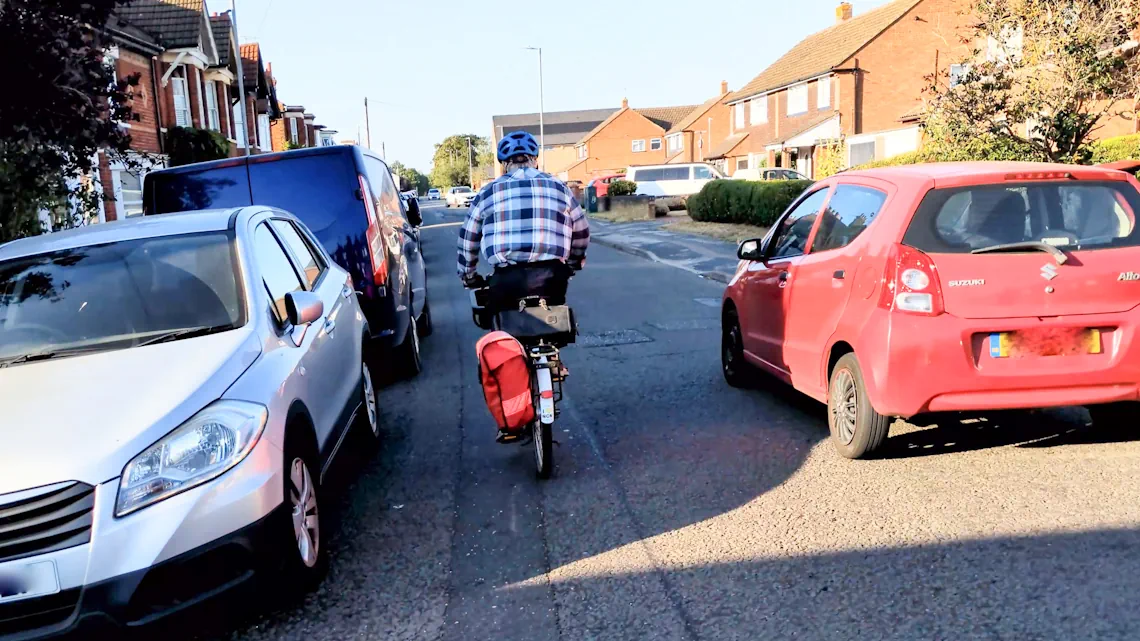 Cyclist in traffic vandyke road